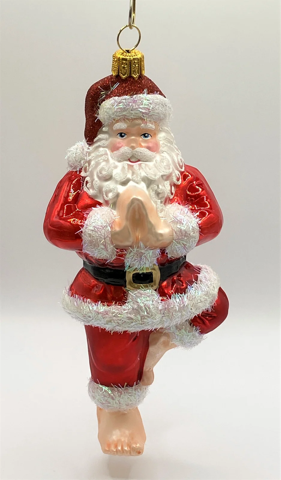 Impuls Santa entspannt sich in der Yoga " Baum Pose "