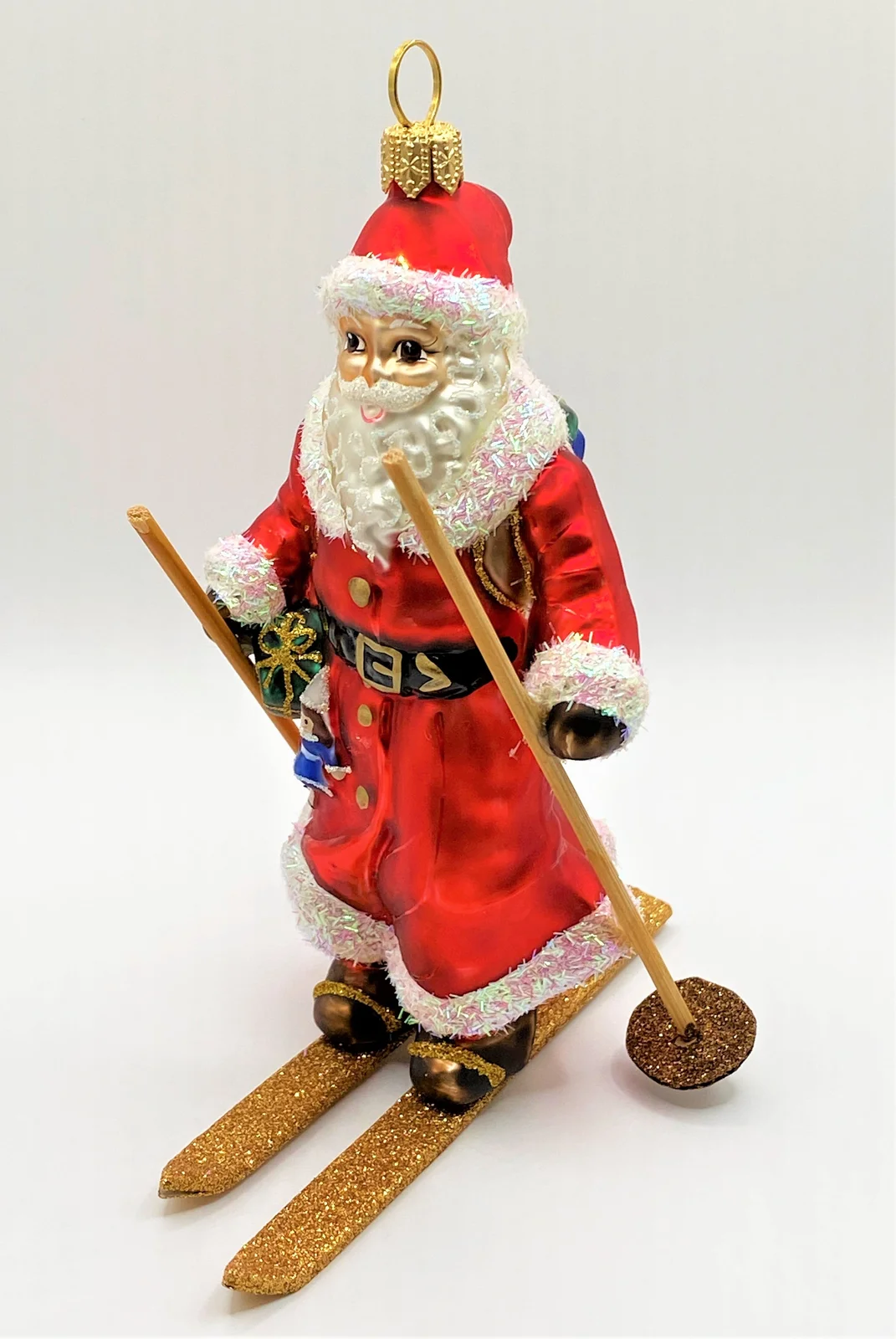 Hanco Weihnachtsmann auf Ski mit Geschenksack