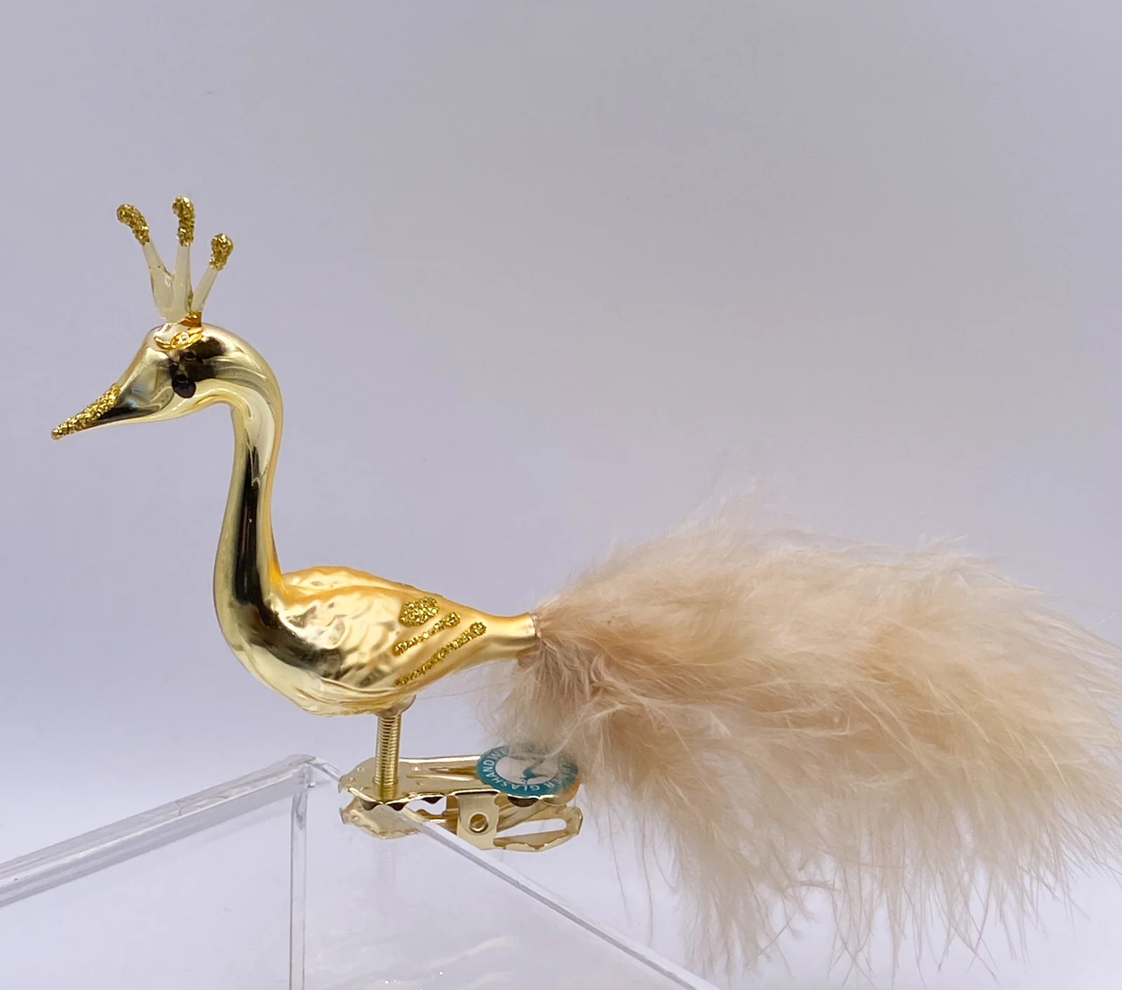 Thüringer Stilisierter goldener Pfau
