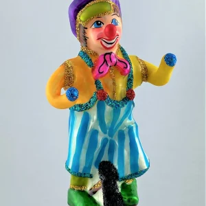 Wiktoria Clown in gestreifter Hose fährt Einrad