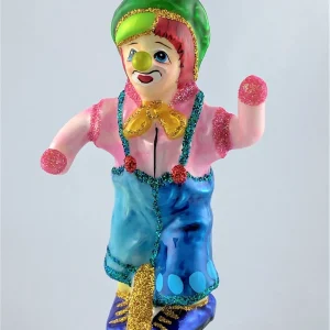 Wiktoria Clown im rosa Hemd fährt Einrad